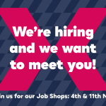 Blue patterned background with a pink chevron in the centre. The words 'We're hiring and we want to meet you!' are overlaid in white writing.